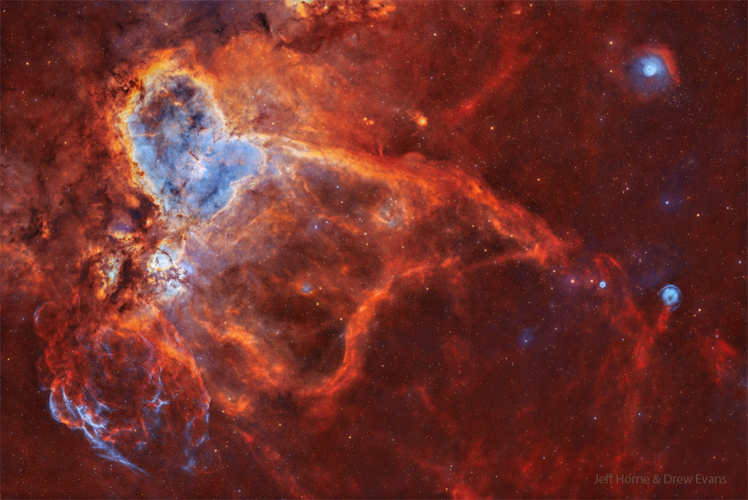 A wide star field is shown with several nebulae as identified by
the rollover image. On the upper left is a large nebula named
the Heart Nebula.
Please see the explanation for more detailed information.