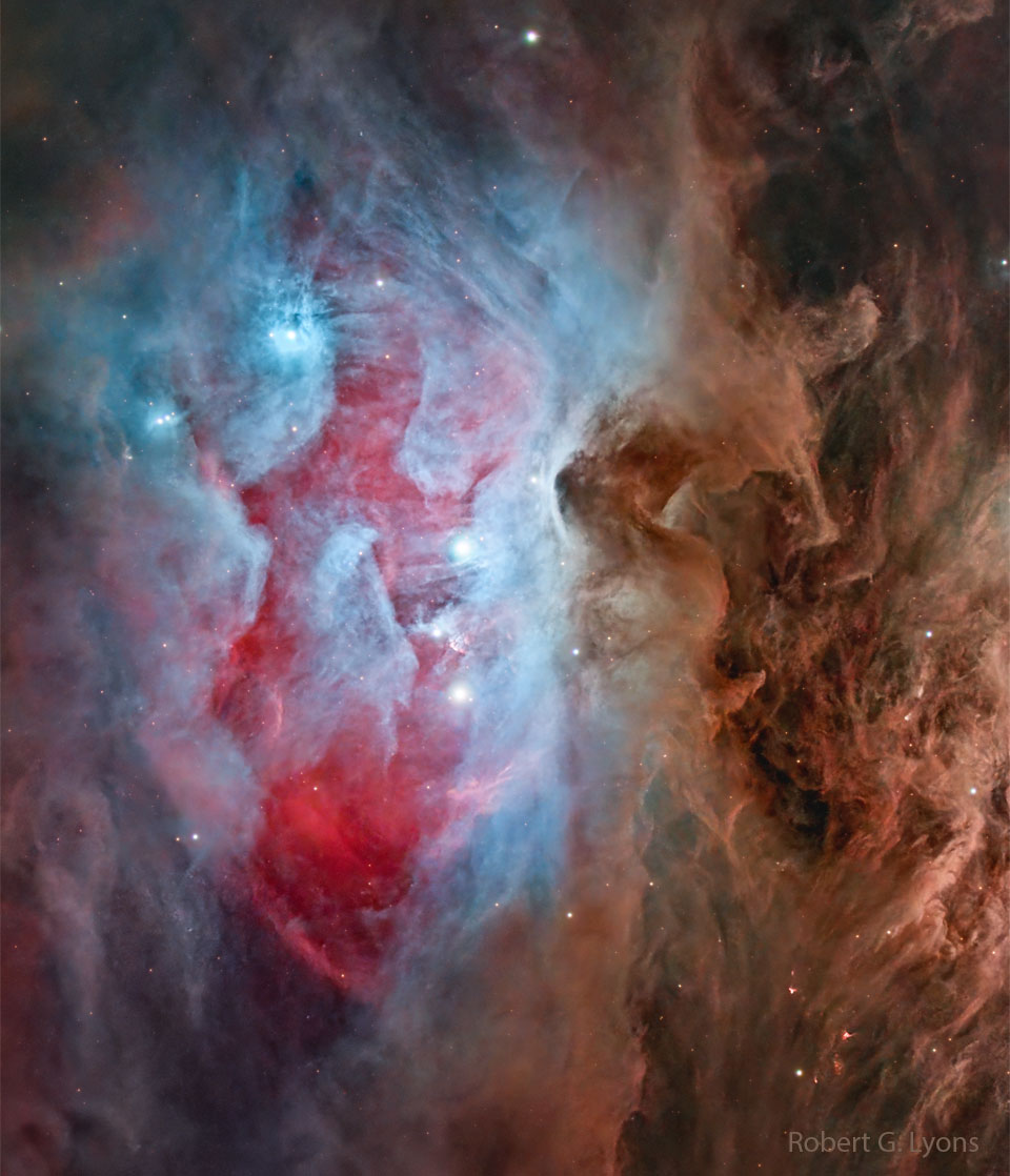 A complex nebula is shown that is mostly blue
and red on the left half and mostly brown on the right.
Several bright stars are visible, and many filaments
run through, in particular on brown dust filamnents
on the image right.
Please see the explanation for more detailed information.