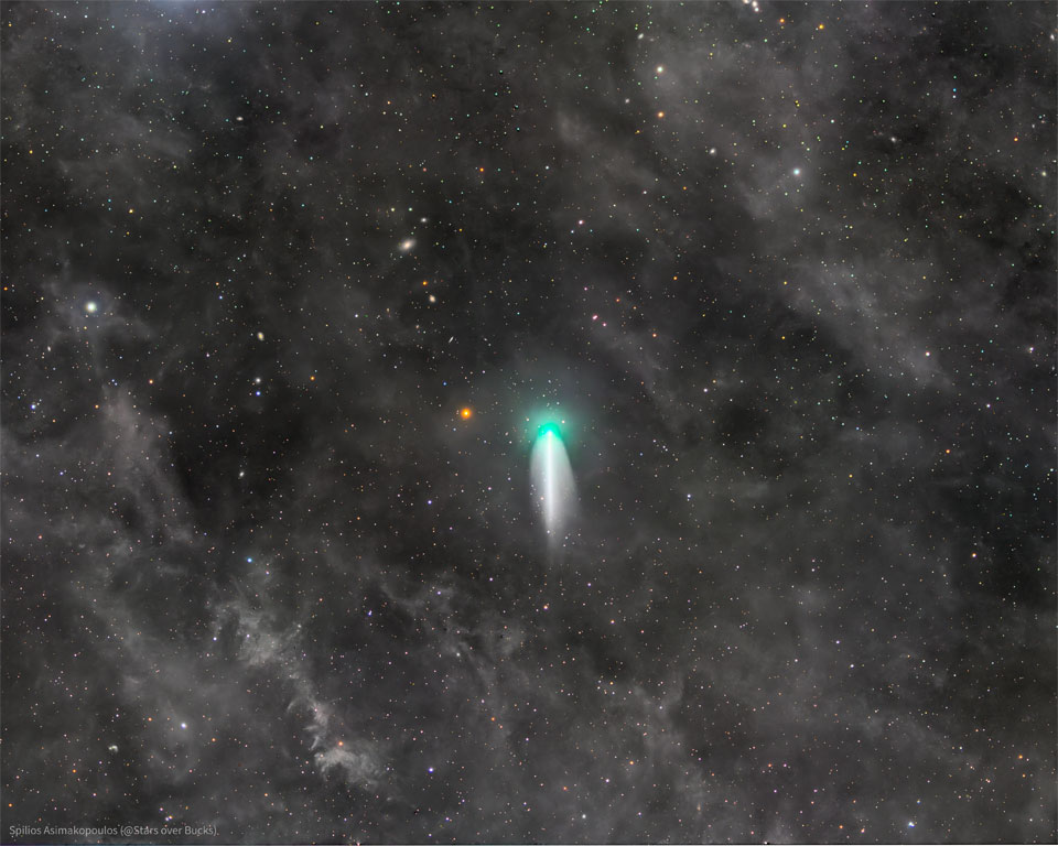 A starfield appears with a bright comet near the
center. The comet has a bright green head and a short
white tail. Around the frame is a complex array of
faint gray nebulas.
Please see the explanation for more detailed information.