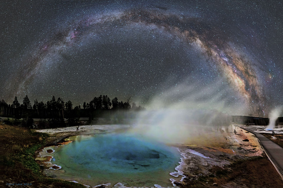 A landscape image shows a starfield above a lake.
Part of the lake is evaporating into the sky on the
right. The arch of the Milky Way Galaxy curves overhead.
It may look like the evaporation is creating the Milky Way.
Please see the explanation for more detailed information.
